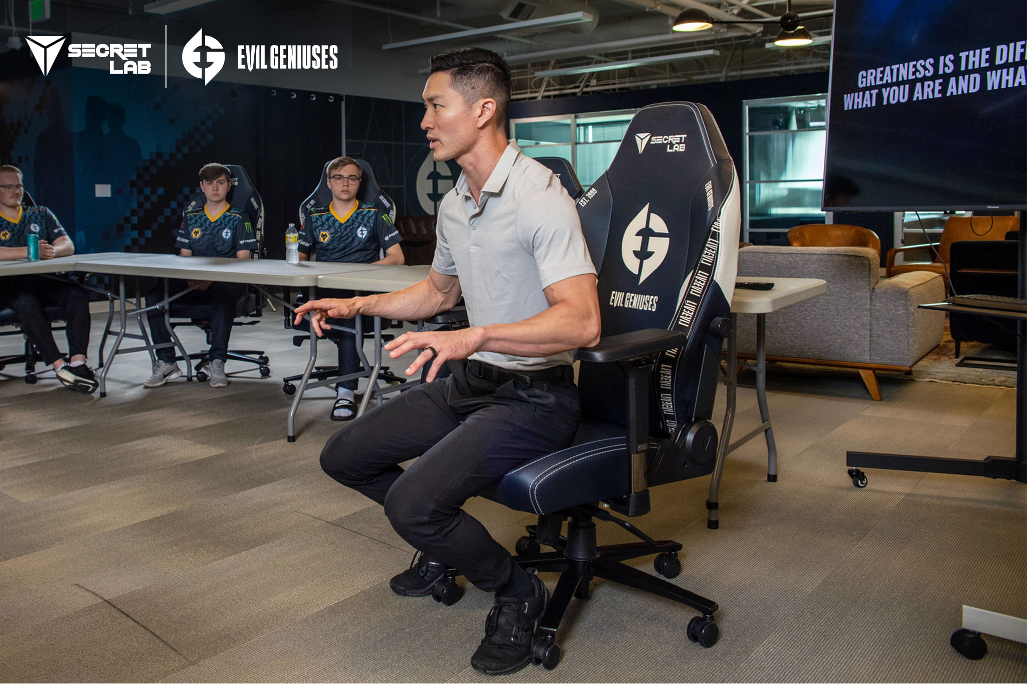 EAB member, Dr. Jordan Tsai (Esports physical therapist for Evil Geniuses and founder of Respawn Therapy) demonstrating the different optimal sitting positions at the Ergonomic Wellness Seminar.